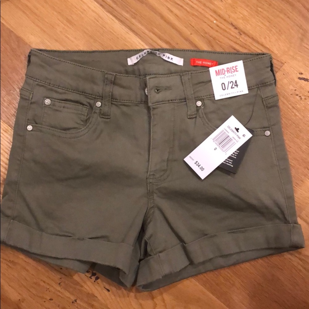 green mid rise shorts